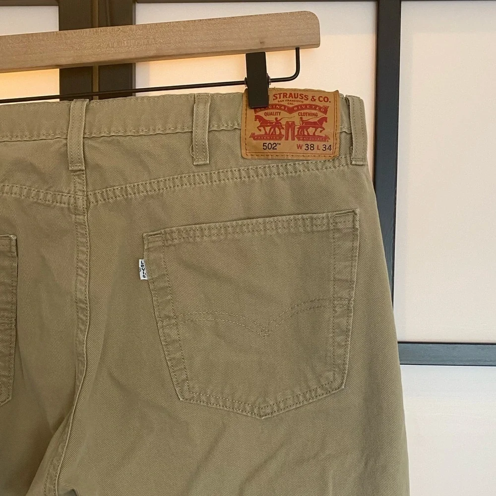 Levi's 502 tan pants. Size 36. HEMMED‎